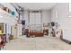 Converted garage offering additional living space with a seating area and vintage decor at 3811 Queen Elizabeth Ct, Laughlin, NV 89029