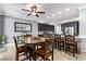 Bright kitchen with a large island, dark wood cabinetry, and stainless steel appliances at 3811 Queen Elizabeth Ct, Laughlin, NV 89029