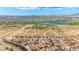 Expansive aerial view of a residential community near a beautiful lake and mountains in the distance at 3811 Queen Elizabeth Ct, Laughlin, NV 89029