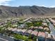Desert community homes feature lush landscaping, mountain views, and swimming pools at 4016 Owlshead Mountain St, Las Vegas, NV 89129