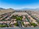 Aerial view highlights a meticulously planned community with desert surroundings at 4016 Owlshead Mountain St, Las Vegas, NV 89129