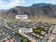An aerial view features a Las Vegas neighborhood close to the beautiful Trigono Hills Park at 4016 Owlshead Mountain St, Las Vegas, NV 89129
