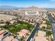 An aerial shot of the neighborhood, complete with well-manicured streets and a view of the park at 4016 Owlshead Mountain St, Las Vegas, NV 89129