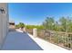 Spacious balcony area with wrought iron railing, offering a spot to enjoy the outdoors at 4016 Owlshead Mountain St, Las Vegas, NV 89129