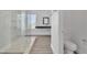 Clean and stylish bathroom offering a tiled shower with seating and modern fixtures at 4016 Owlshead Mountain St, Las Vegas, NV 89129