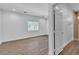 Bright bedroom with a window and neutral paint and modern flooring at 4016 Owlshead Mountain St, Las Vegas, NV 89129