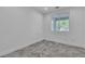 This bedroom features modern floors, neutral walls, a double hung window, and ample natural light at 4016 Owlshead Mountain St, Las Vegas, NV 89129