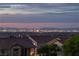 Stunning Las Vegas skyline at dusk visible from this property, with vibrant lights and a picturesque view at 4016 Owlshead Mountain St, Las Vegas, NV 89129