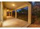 Inviting covered patio area with ample space for seating and enjoying the landscaped backyard at 4016 Owlshead Mountain St, Las Vegas, NV 89129