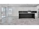 Modern kitchen featuring an island with white cabinets and stainless steel appliances at 4016 Owlshead Mountain St, Las Vegas, NV 89129