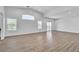 Bright living room with high ceilings and expansive wood-look floors at 4016 Owlshead Mountain St, Las Vegas, NV 89129