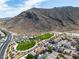 Enjoy the view of Trigono Hills Park in this aerial image, offering green spaces and recreational areas at 4016 Owlshead Mountain St, Las Vegas, NV 89129