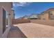 A long, private backyard is ready for landscaping at 4448 Mahogany Hills Ave, Las Vegas, NV 89141