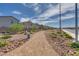 Well maintained community trail with native landscaping and desert rock at 4448 Mahogany Hills Ave, Las Vegas, NV 89141