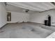 Spacious two-car garage with water filtration system, ready for vehicles and storage at 4448 Mahogany Hills Ave, Las Vegas, NV 89141