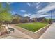 A large, well-maintained green space offering residents a tranquil and inviting area at 4448 Mahogany Hills Ave, Las Vegas, NV 89141