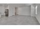 Tiled living room in a modern color scheme with light-filled rooms at 4448 Mahogany Hills Ave, Las Vegas, NV 89141