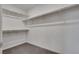 Walk-in closet featuring shelving for ample storage at 4448 Mahogany Hills Ave, Las Vegas, NV 89141