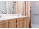 Well-maintained bathroom with a double vanity and accessible shower at 4970 Black Bear Rd # 101, Las Vegas, NV 89149