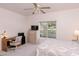 Comfortable bedroom area with a TV and desk at 4970 Black Bear Rd # 101, Las Vegas, NV 89149