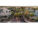 Painted Desert's guard gated Primary plan boasts lush landscaping, a beautiful golf course, and mature trees throughout at 4970 Black Bear Rd # 101, Las Vegas, NV 89149