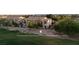 Townhome exterior features east facing windows and golf course and mountain views at 4970 Black Bear Rd # 101, Las Vegas, NV 89149