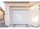 Clean garage with a closed white door at 4970 Black Bear Rd # 101, Las Vegas, NV 89149