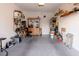 Functional garage with a work area, storage shelves, and a variety of tools at 4970 Black Bear Rd # 101, Las Vegas, NV 89149