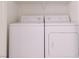 A functional laundry room equipped with a washer and dryer, ready for use at 4970 Black Bear Rd # 101, Las Vegas, NV 89149