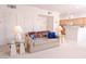 Open-concept living room showcasing seamless flow to the kitchen and dining area at 4970 Black Bear Rd # 101, Las Vegas, NV 89149