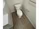 A clean bathroom with a white toilet and neutral paint at 5316 Fieldstone Rd, Las Vegas, NV 89107