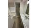 Bright bathroom featuring a shower, a tub, and a vanity with black hardware and white countertop at 5316 Fieldstone Rd, Las Vegas, NV 89107