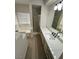 Modern bathroom features a large vanity, bright white counters, and a separate tub and shower at 5316 Fieldstone Rd, Las Vegas, NV 89107