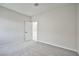 Bedroom featuring neutral paint and carpet with a door that leads to a hallway at 5316 Fieldstone Rd, Las Vegas, NV 89107