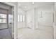 Inviting entryway with tile floors, leading to open living spaces and natural light at 5316 Fieldstone Rd, Las Vegas, NV 89107