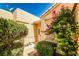 Charming home exterior with lush landscaping and a welcoming entrance at 5316 Fieldstone Rd, Las Vegas, NV 89107