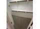 Clean walk-in closet with rod, shelves, and neutral carpet at 5316 Fieldstone Rd, Las Vegas, NV 89107