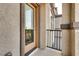 Balcony exterior with stucco columns and wrought iron railing, providing outdoor space at 538 Ylang Pl, Henderson, NV 89015