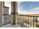 Balcony with wrought iron railing offering scenic views of the surrounding landscape at 538 Ylang Pl, Henderson, NV 89015