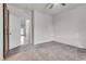 Bedroom featuring neutral carpet and a barn door leading to another room at 538 Ylang Pl, Henderson, NV 89015