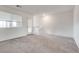 Bright bonus room with window, access to outside, and neutral carpet provides versatile living space at 538 Ylang Pl, Henderson, NV 89015