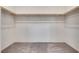 Walk-in closet with ample shelving and neutral carpet, ready for organization at 538 Ylang Pl, Henderson, NV 89015