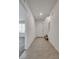 Open entryway with tile flooring, white walls, and access to stairs and open room at 538 Ylang Pl, Henderson, NV 89015