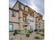 Three-story townhome with private balconies, desert landscaping at 538 Ylang Pl, Henderson, NV 89015