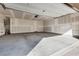 Spacious two-car garage with concrete floor and overhead door, offering ample parking at 538 Ylang Pl, Henderson, NV 89015