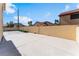 This home features a large backyard patio area with tall privacy walls at 5516 Cory Pl, Las Vegas, NV 89107