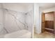 This bathroom features a shower with marble tile and a soaking tub at 5516 Cory Pl, Las Vegas, NV 89107