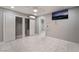 Bedroom featuring tile flooring, with a view of closets and attached room at 5516 Cory Pl, Las Vegas, NV 89107