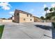 Exterior view of home with backyard patio, privacy walls, and solar panels at 5516 Cory Pl, Las Vegas, NV 89107