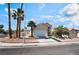 Charming two-story home with palm trees and a well-maintained front yard at 5516 Cory Pl, Las Vegas, NV 89107